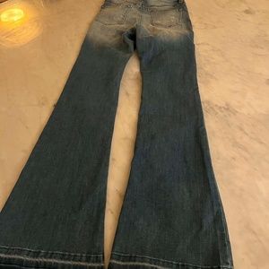 Faded, distressed, light blue Harper Heritage sz 25 jean w/flared leg